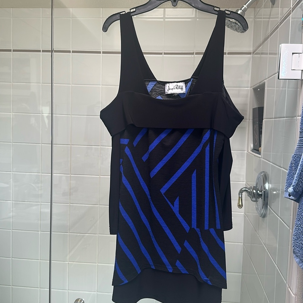 Joseph Ribkoff tunic with cut out shoulders.